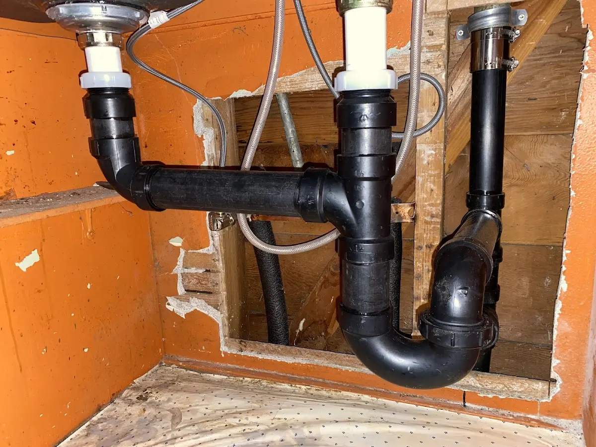 Professional Garbage Disposal Repair equipment and tools on the job in Silver Lake